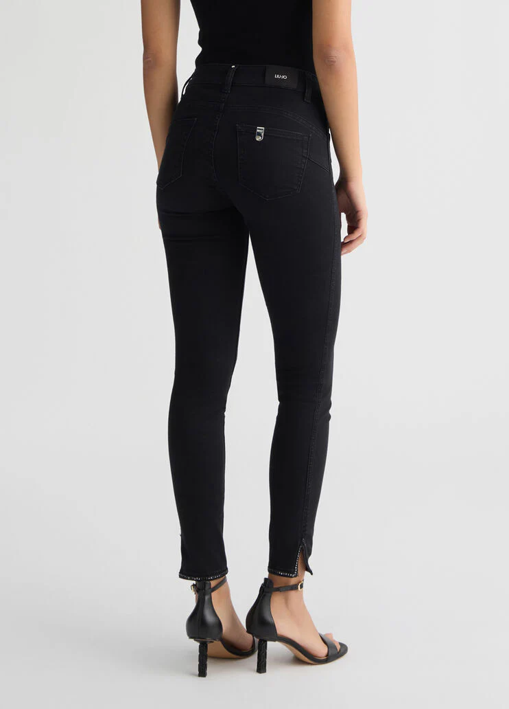 Black skinny jeans with slit