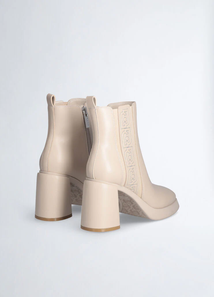 Beige ankle boots with logo
