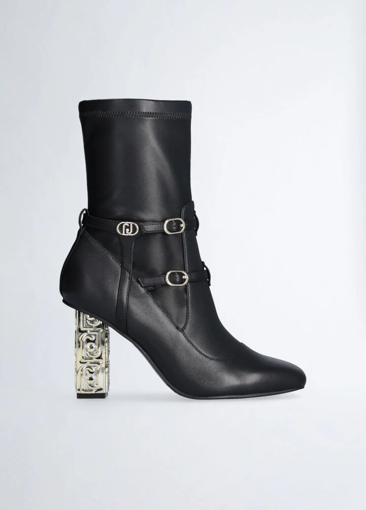 Ankle boots with branded heel