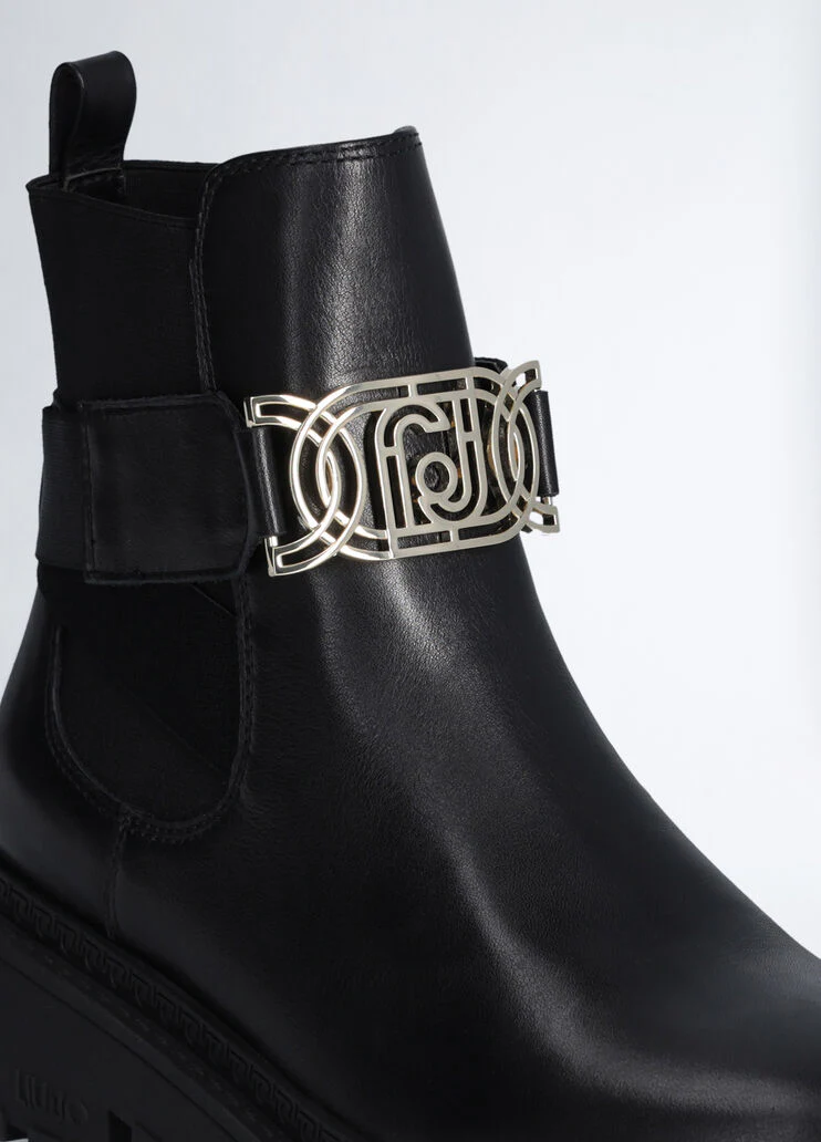 Black ankle boots with maxi-logo