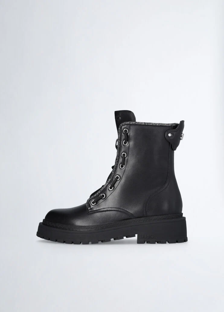 Combat boots with rhinestone trim