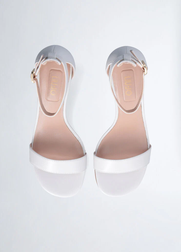 Sandals with branded heel