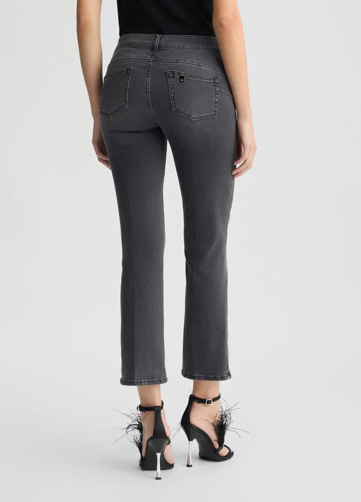 Black bootcut jeans with rhinestones