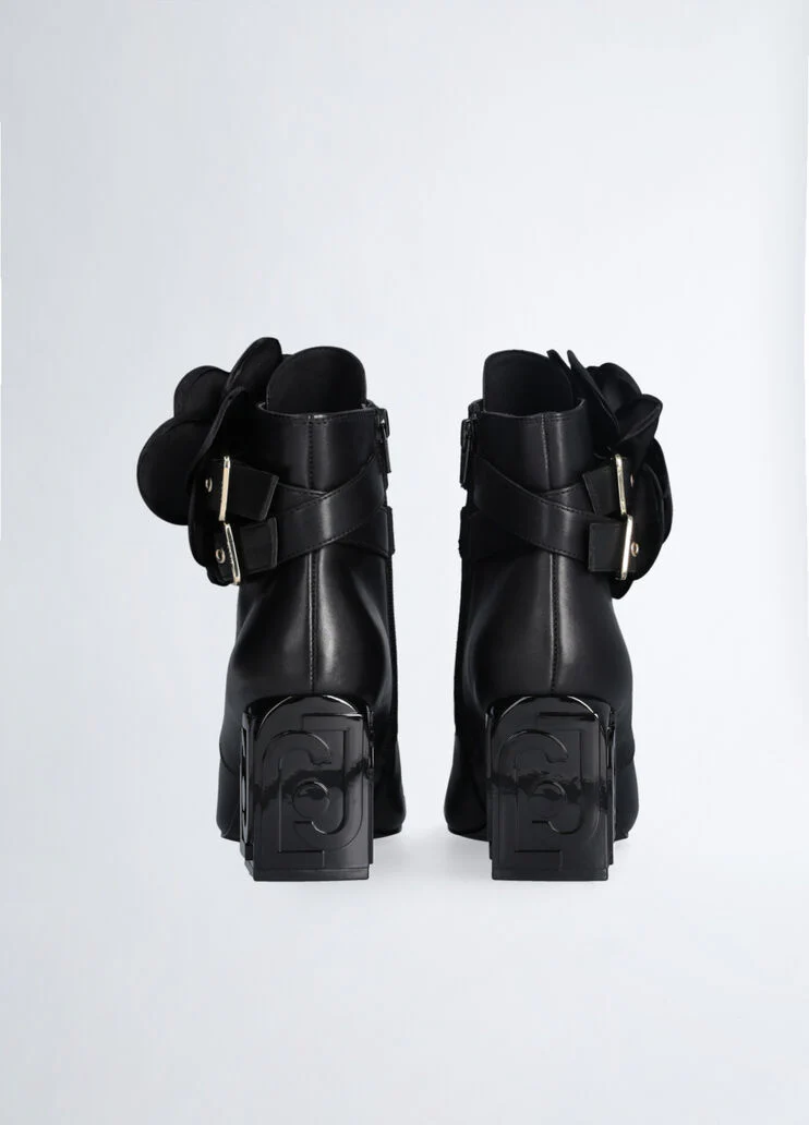 Leather ankle boot with flower detail