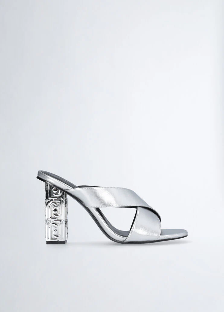 Sandals with branded heel