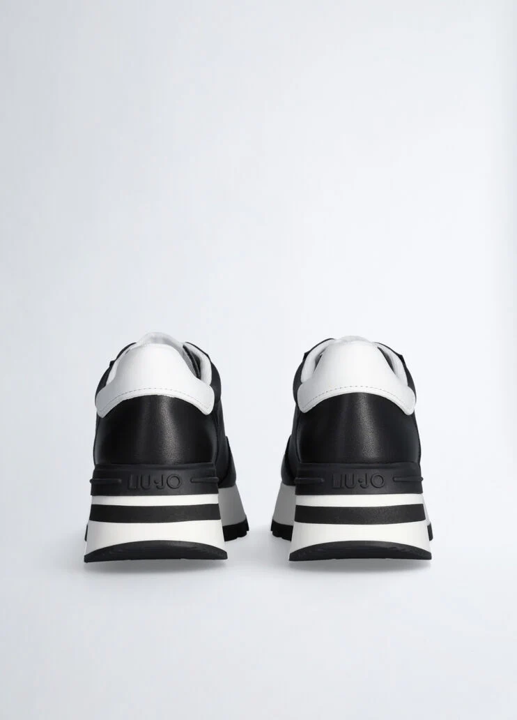 Leather sneakers with openwork logo