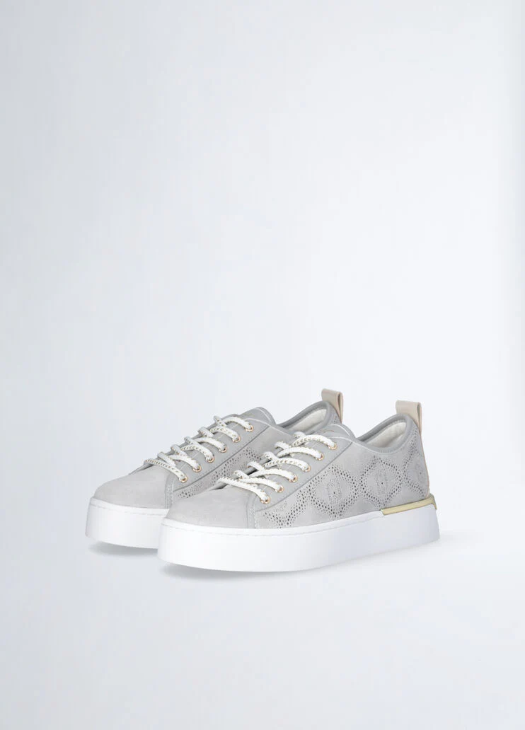 Sneakers with perforated weave