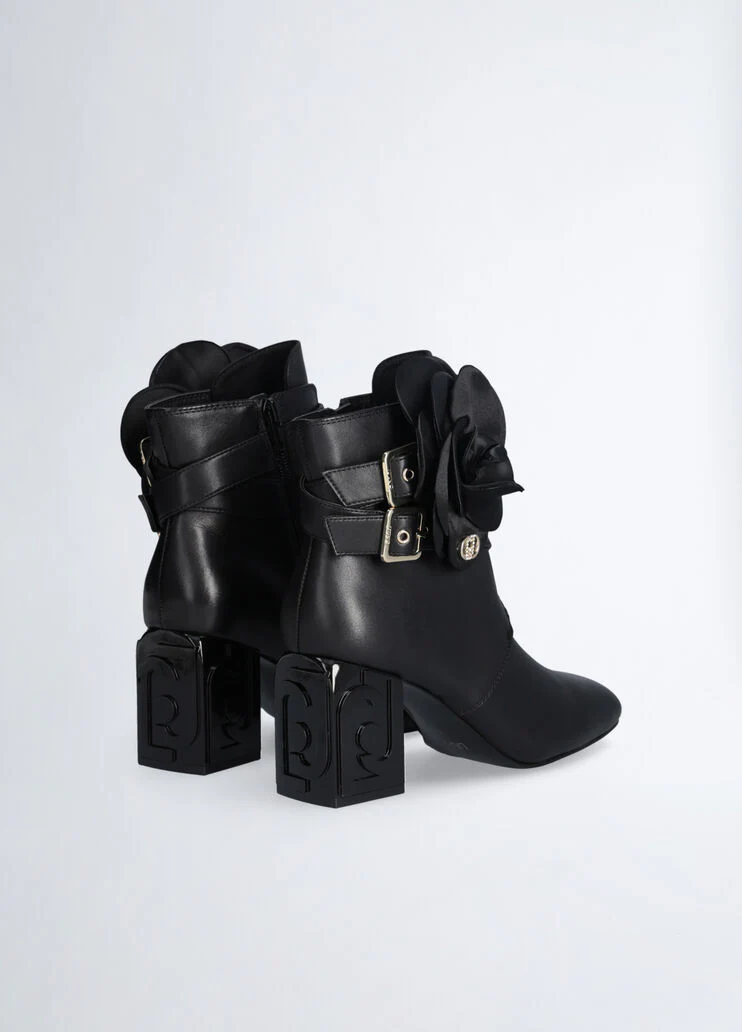 Leather ankle boot with flower detail