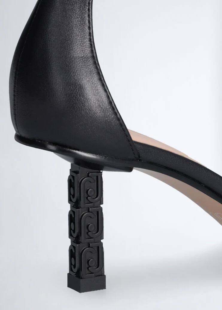 Sandals with branded heel