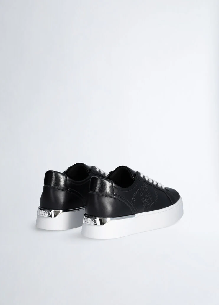 Leather sneakers with openwork logo