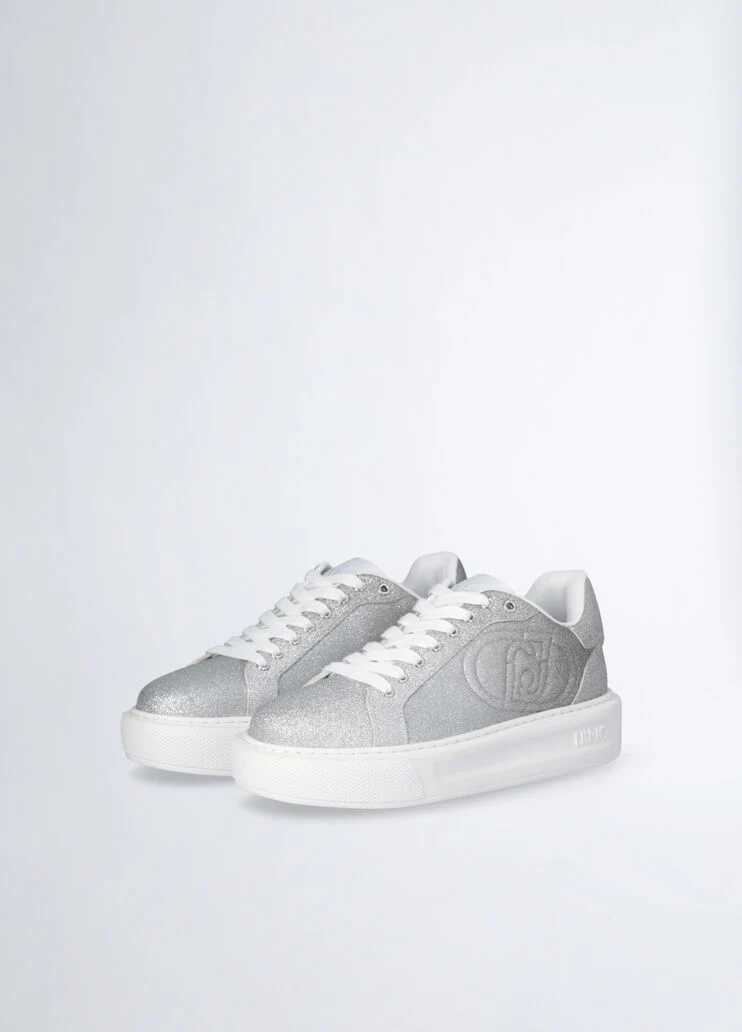 Sneakers with faded glittery detailing