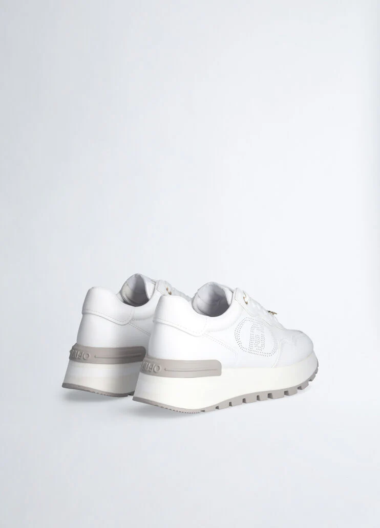 Leather sneakers with openwork logo