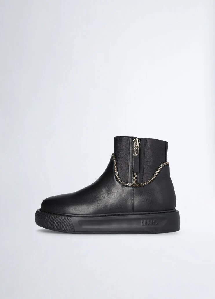 Black leather ankle boots with rhinestones