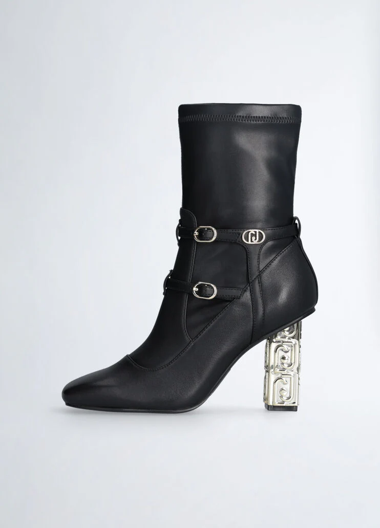 Ankle boots with branded heel