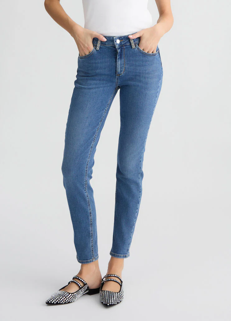 Blue skinny jeans with rhinestones