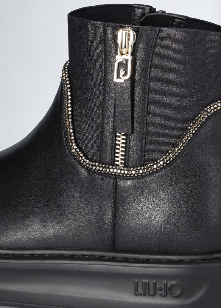 Black leather ankle boots with rhinestones