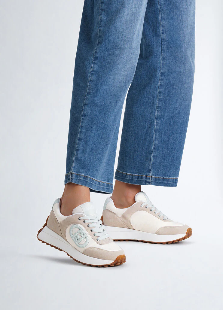 Beige sneakers with light blue logo