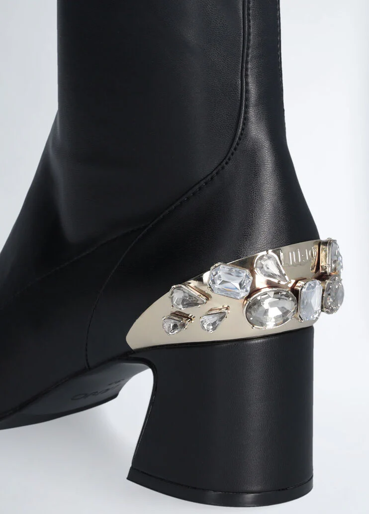 Black ankle boots with bejewelled gemstones