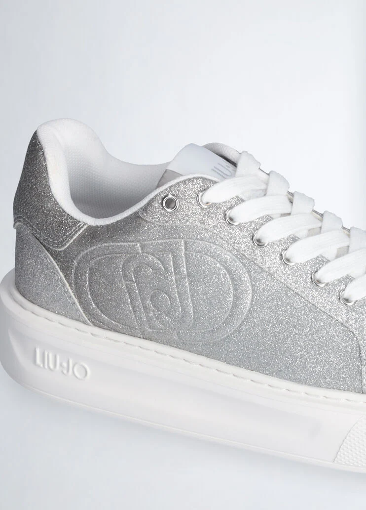 Sneakers with faded glittery detailing