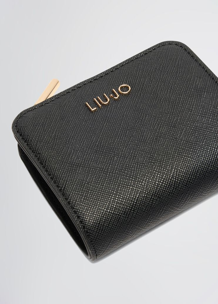 Card holder with zip
