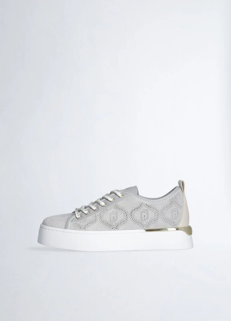 Sneakers with perforated weave