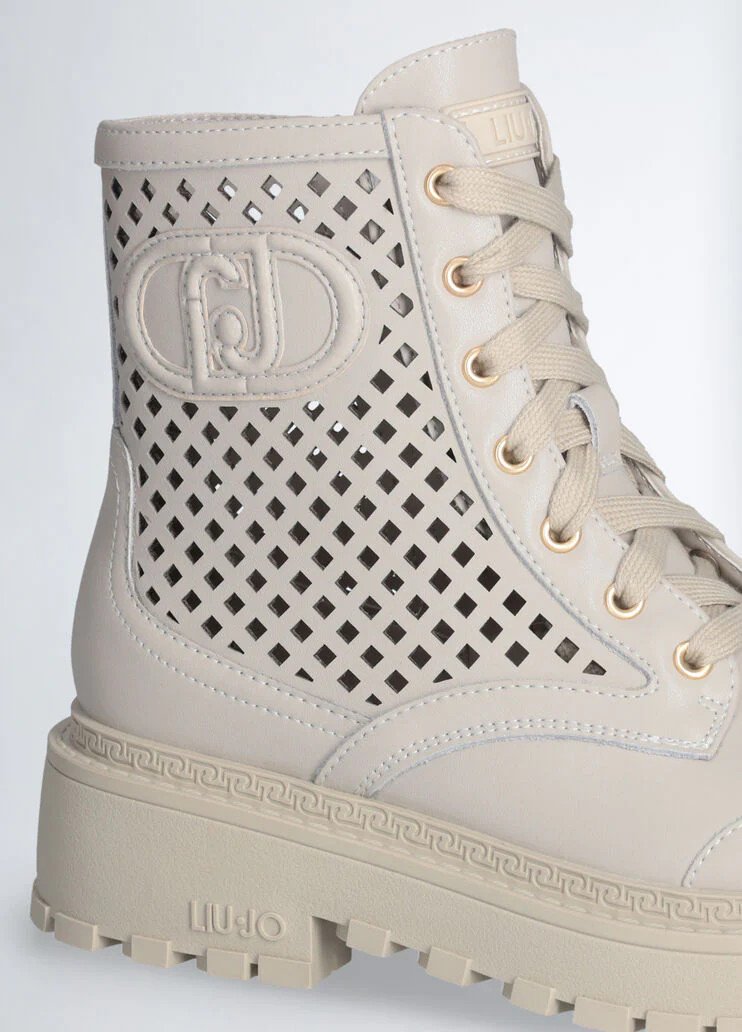 Perforated leather combat boots