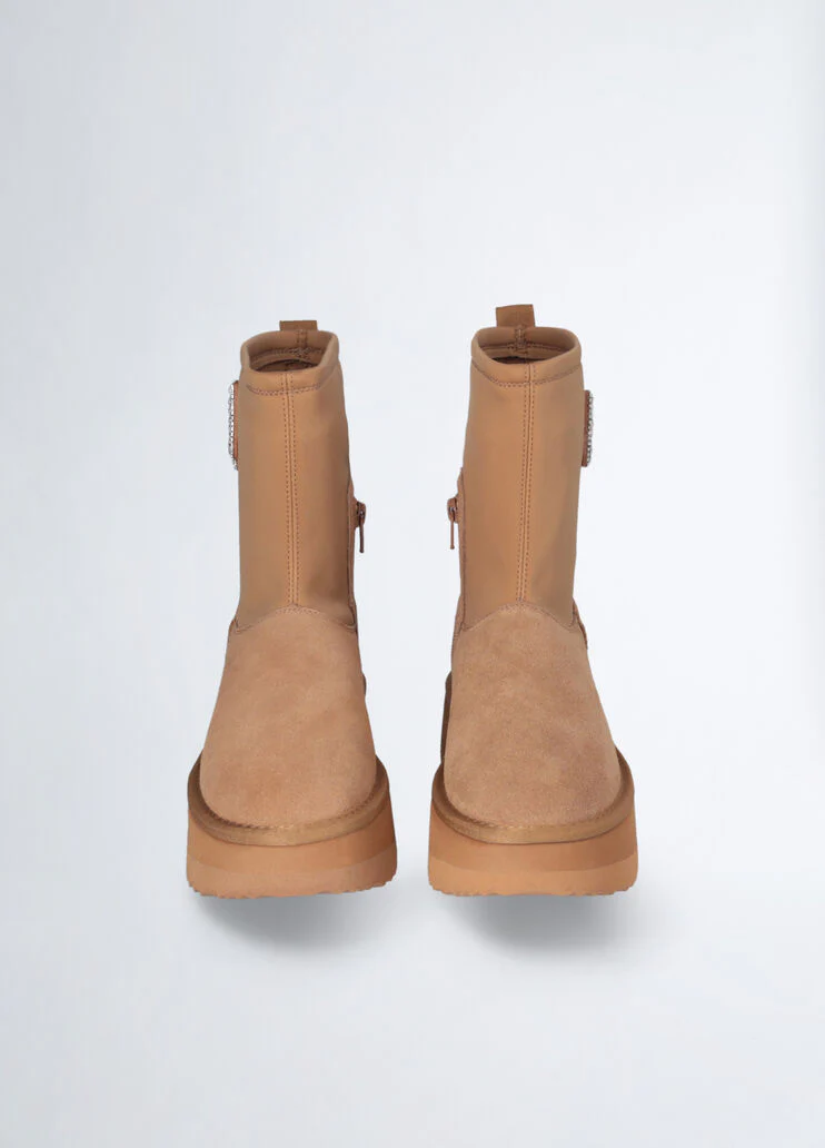 Warm ankle boots with bejewelled logo