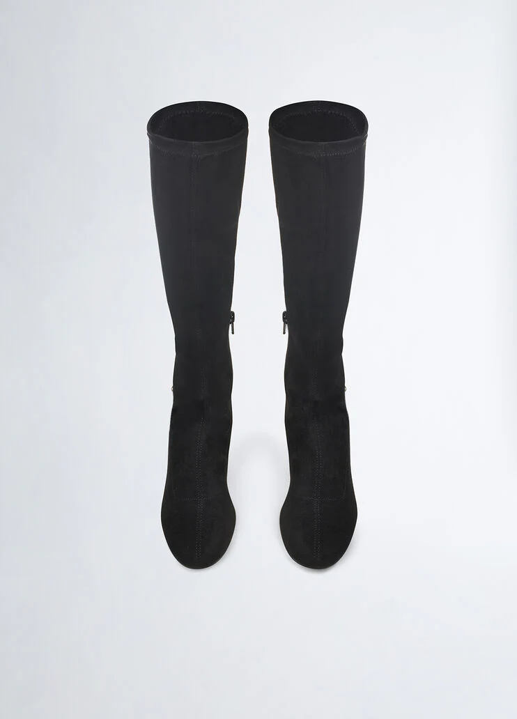 Knee-high boots with bejewelled gemstones