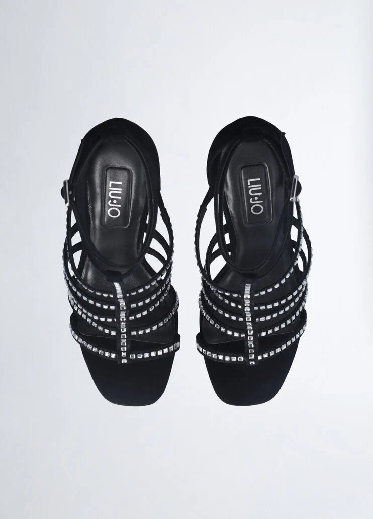 Sandals with branded heel