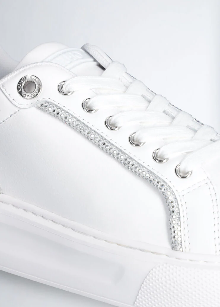 White sneakers with rhinestone trims