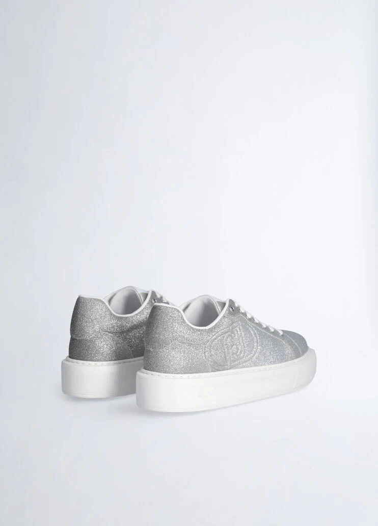 Sneakers with faded glittery detailing