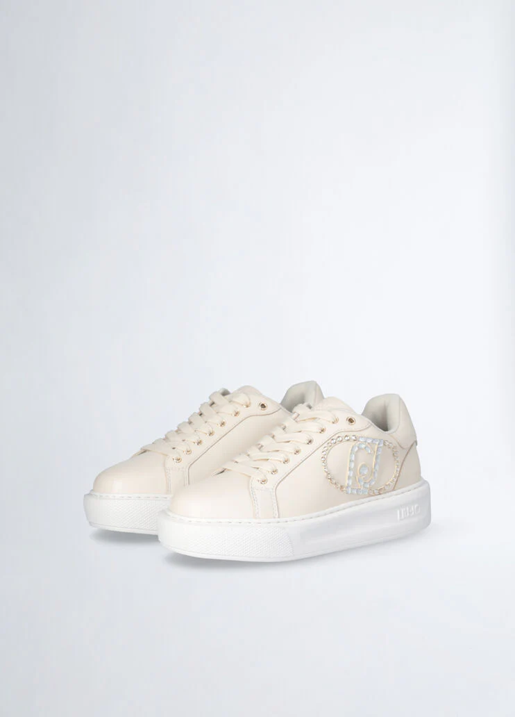 Sneakers with jewel logo