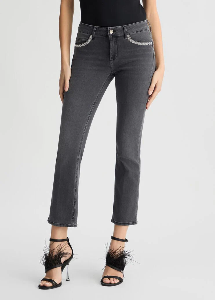 Black bootcut jeans with rhinestones