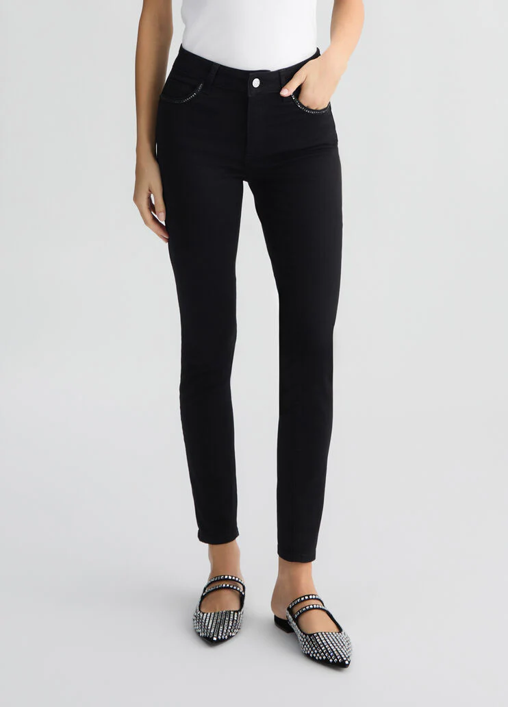 Black skinny jeans with rhinestones
