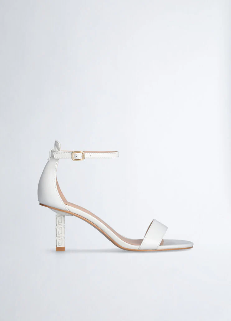 Sandals with branded heel