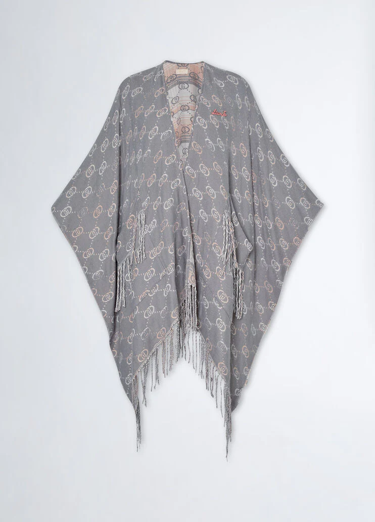 Poncho with jacquard logo