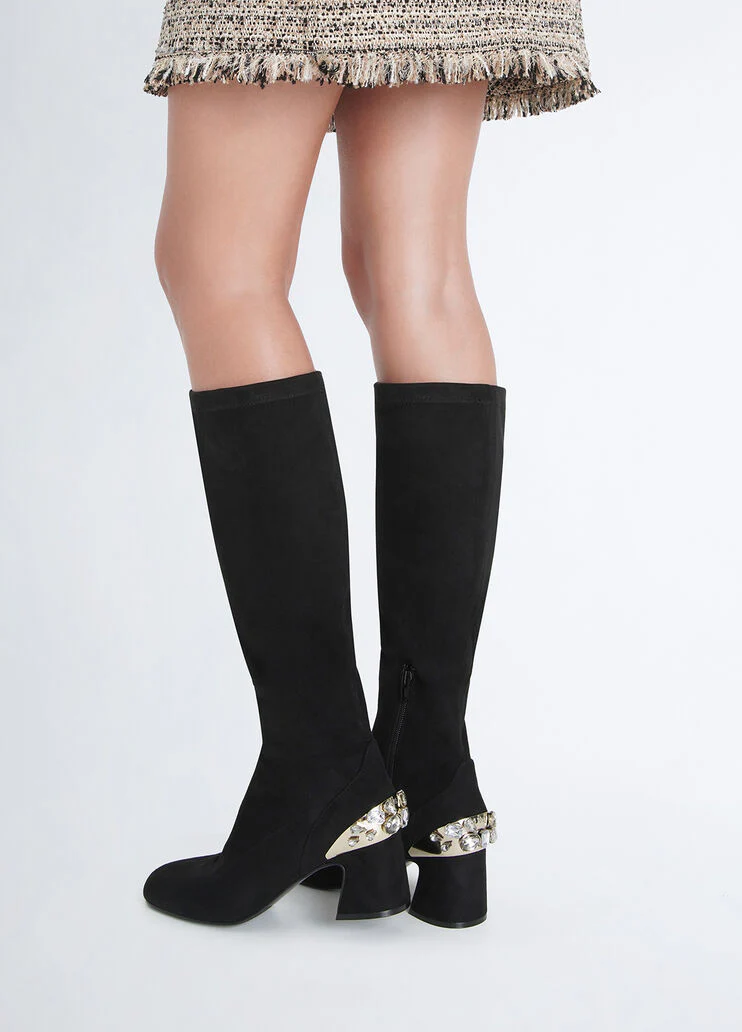 Knee-high boots with bejewelled gemstones