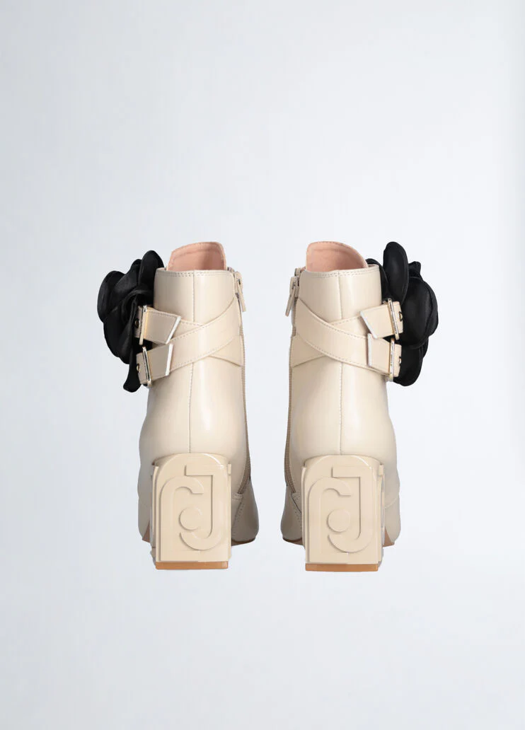 Leather ankle boot with flower detail