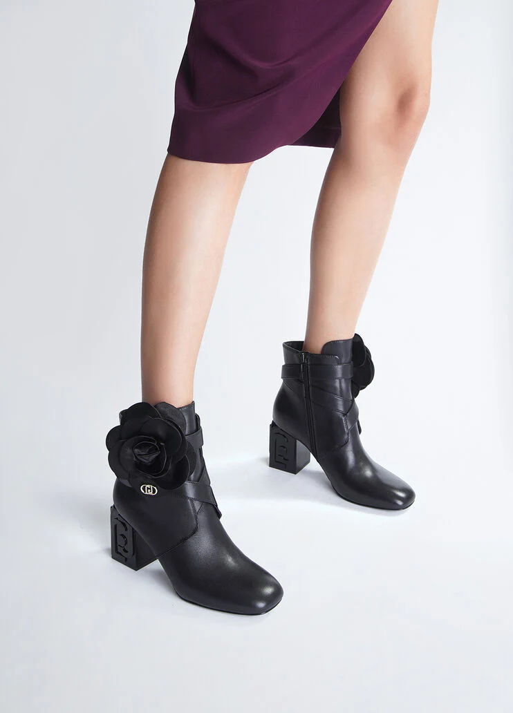 Leather ankle boot with flower detail
