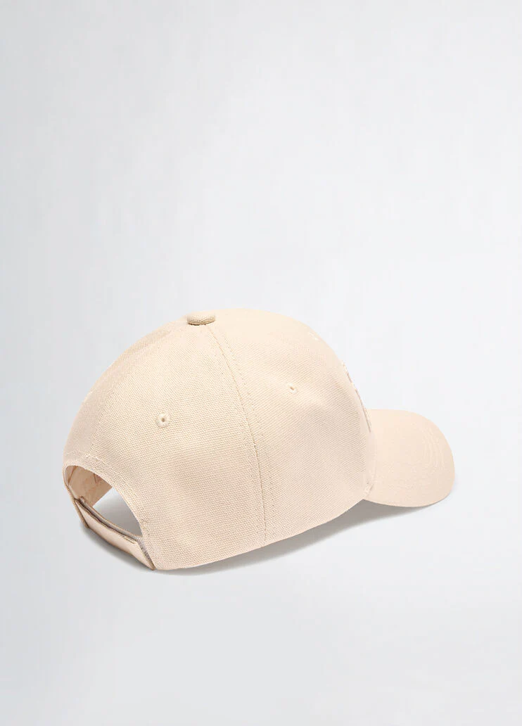 Champagne-coloured baseball cap