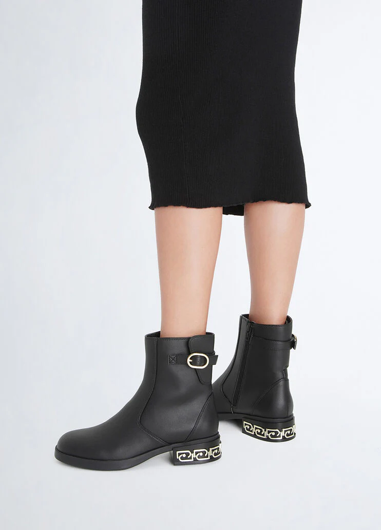 Black ankle boots with buckle