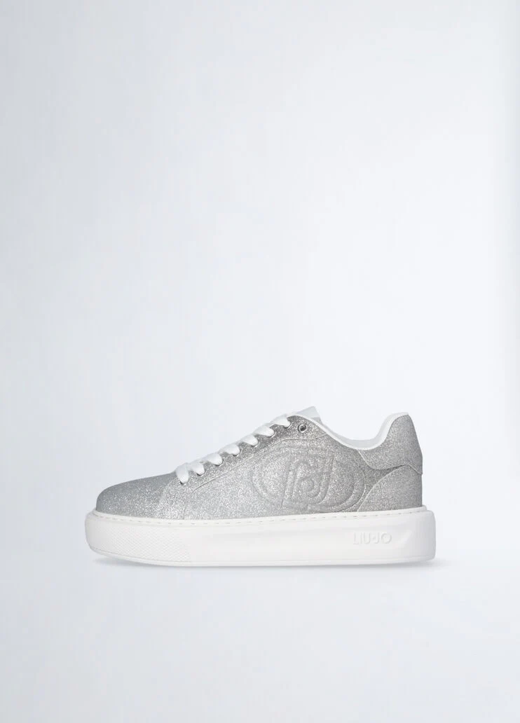 Sneakers with faded glittery detailing
