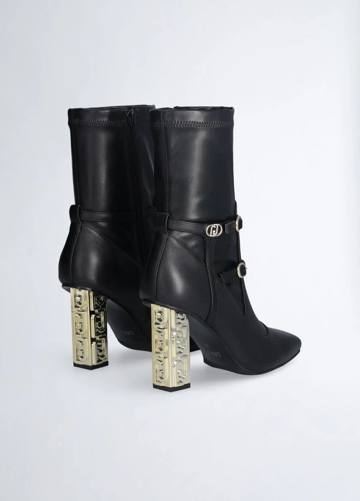Ankle boots with branded heel
