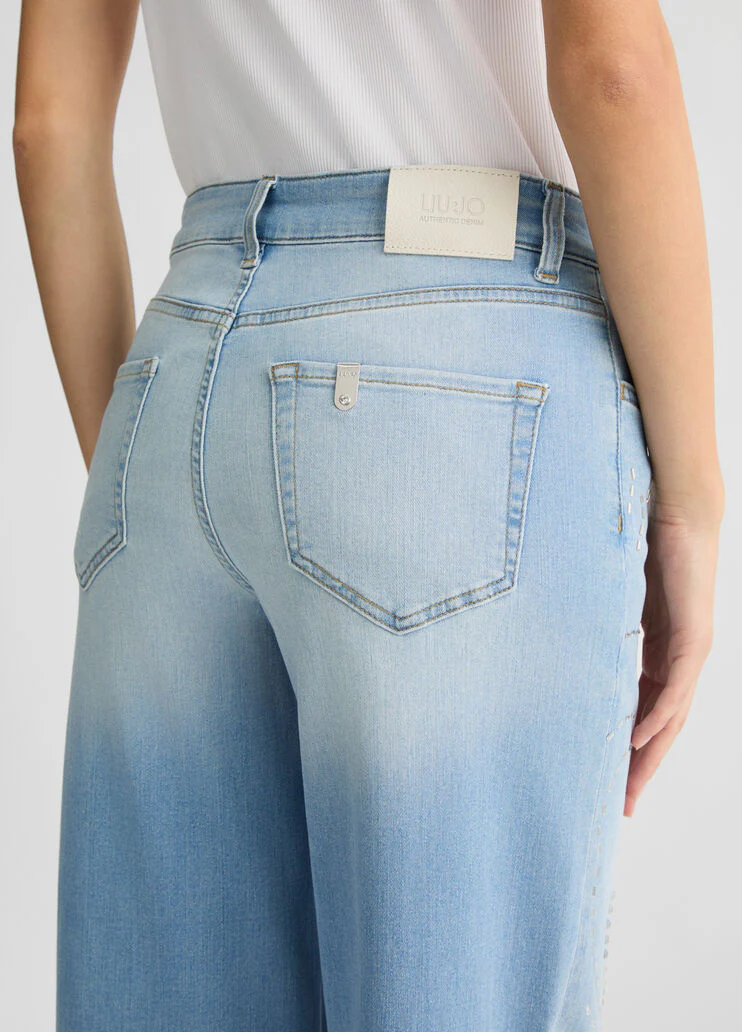 Flared jeans with studs