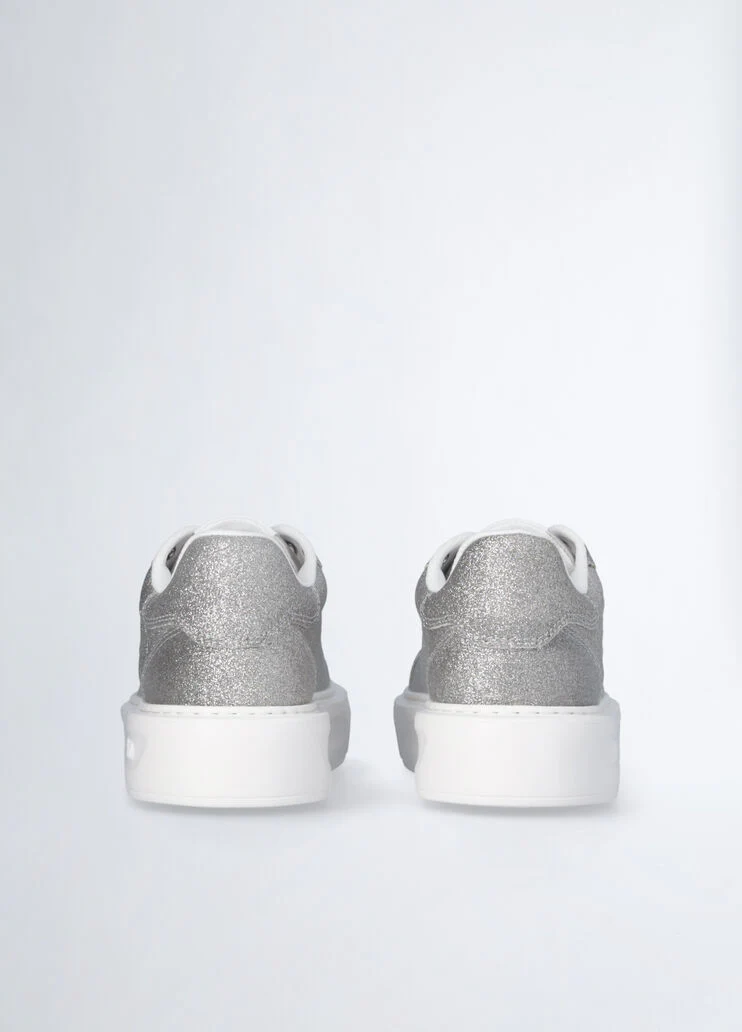 Sneakers with faded glittery detailing