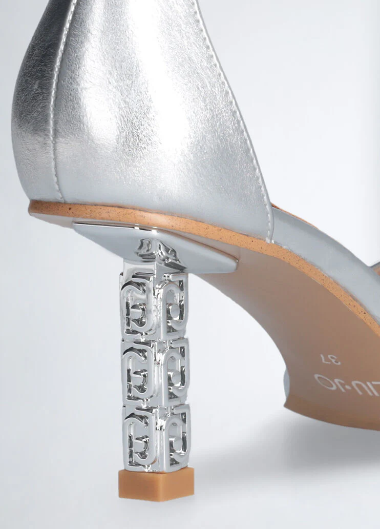 Sandals with branded heel