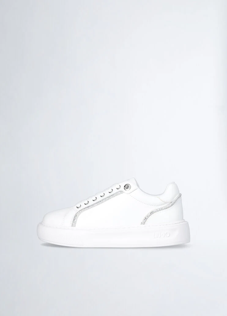 White sneakers with rhinestone trims