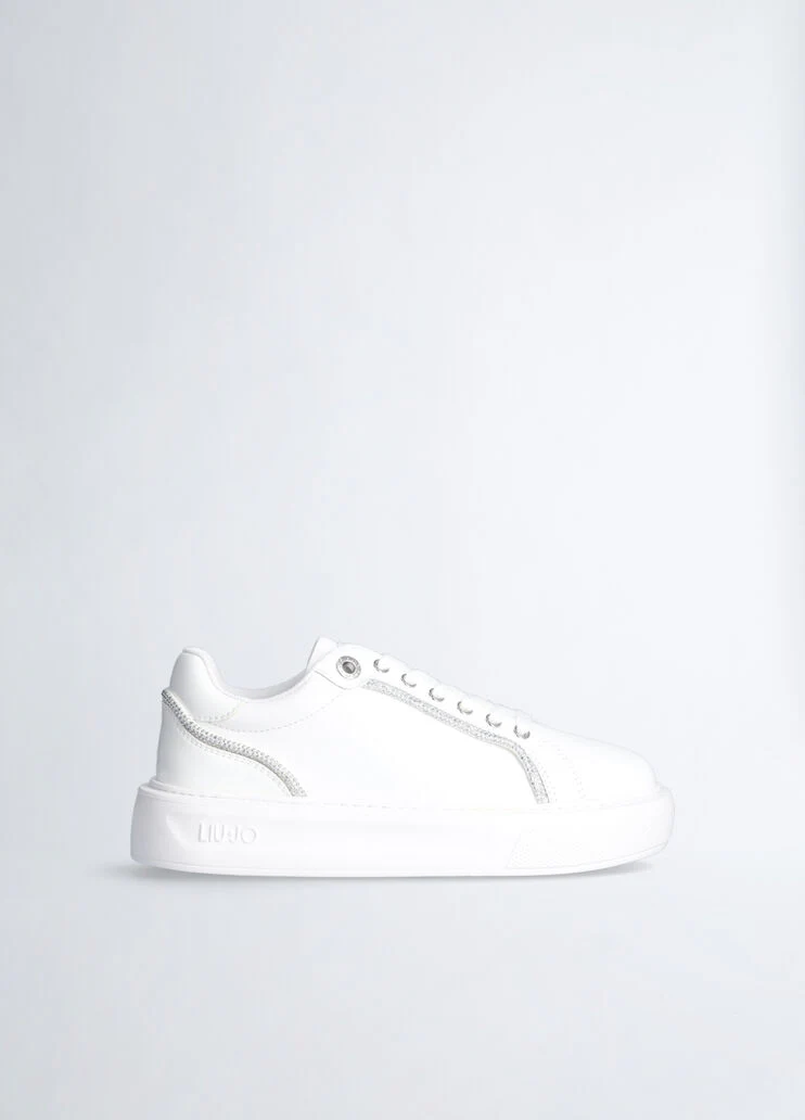 White sneakers with rhinestone trims