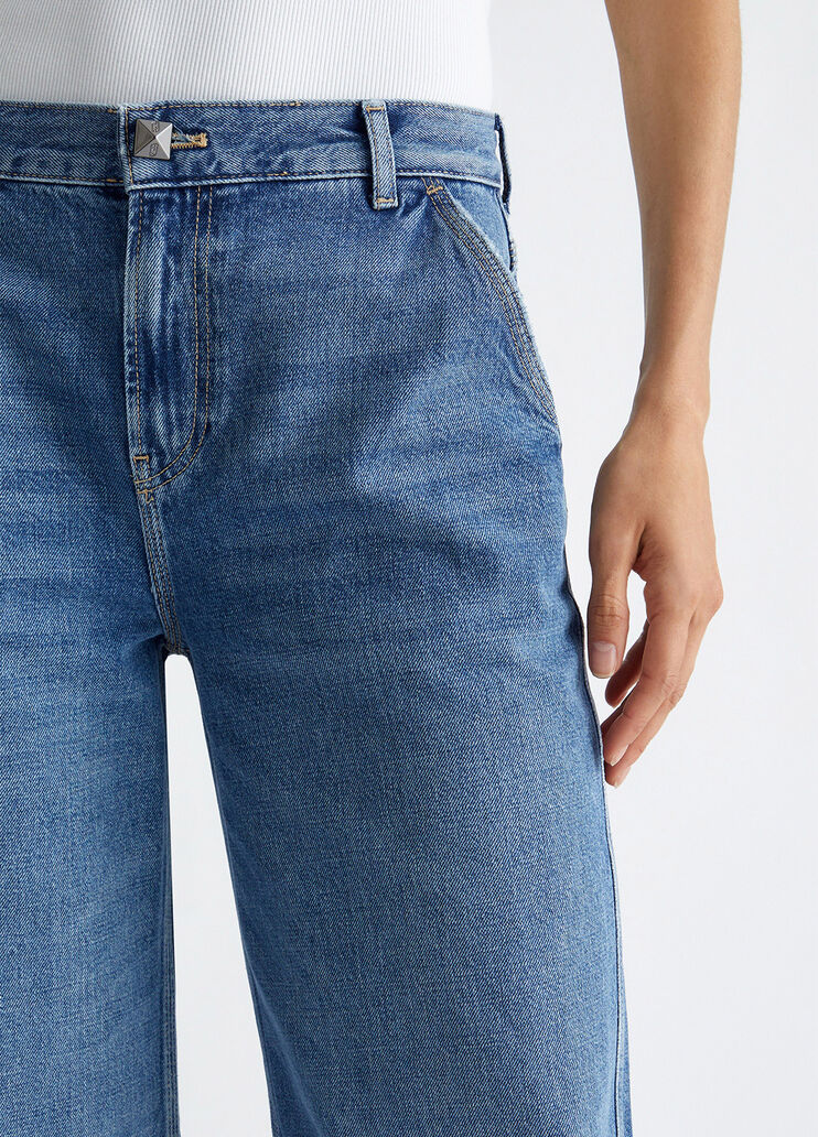 Flared jeans with studs