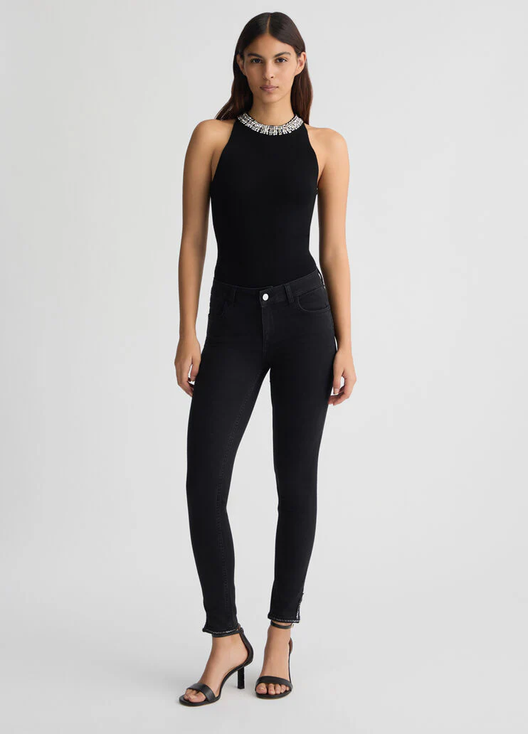 Black skinny jeans with slit